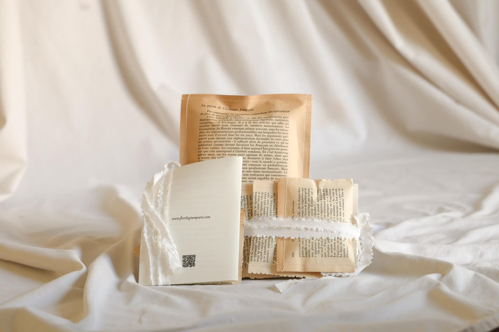 Florilegium Paris natural dyeing kit packaging — handmade from reclaimed vintage book pages — sustainable artisan packaging made in Paris