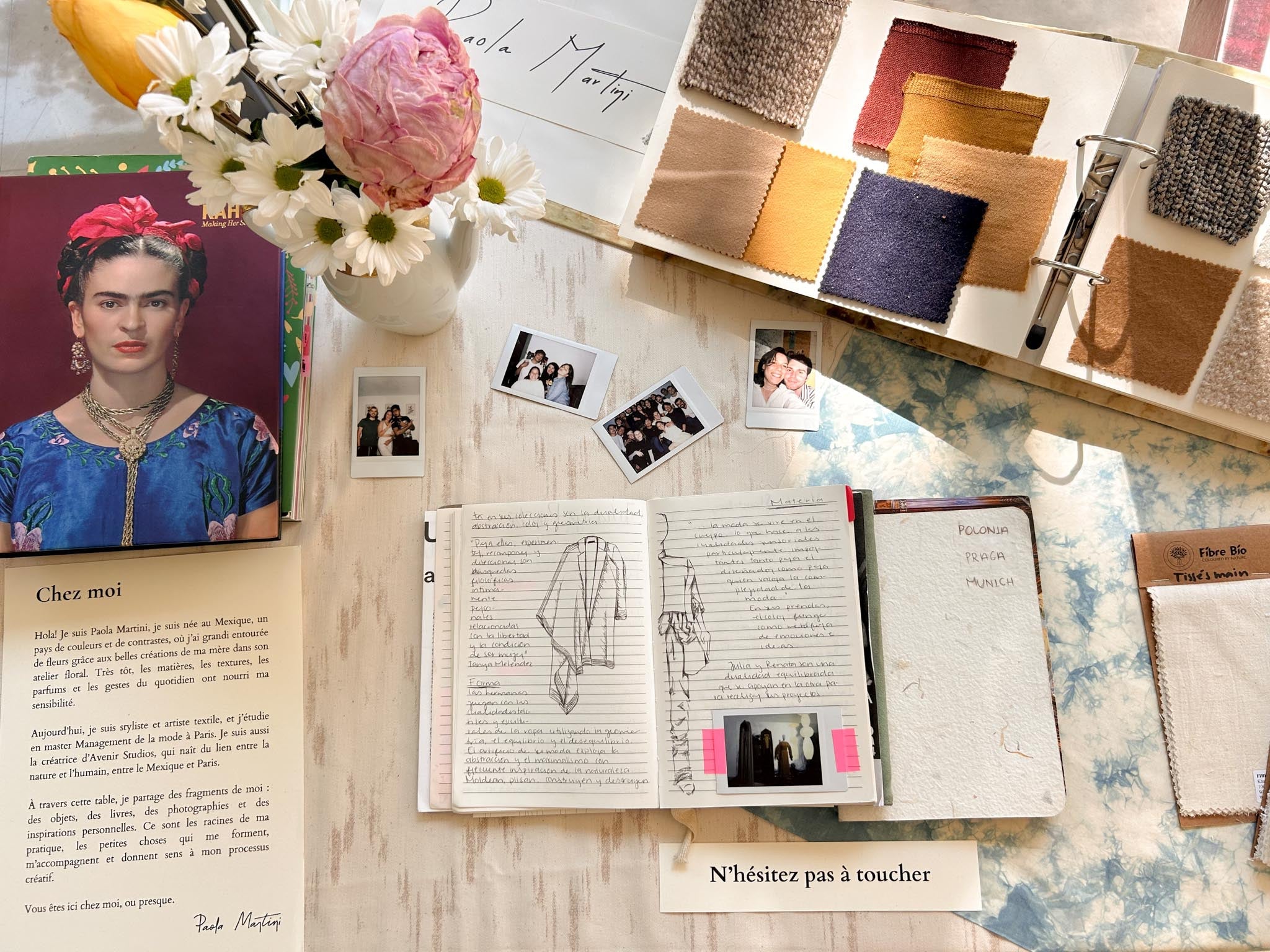 Open book with notes, photos, and color swatches on a wooden surface. Hand-dyed ecoprint fabric made with natural pigments during a botanical workshop in Paris — Florilegium Paris